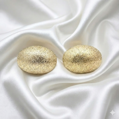 Золотисті фактурні сережки-овали "Зоряний пил"