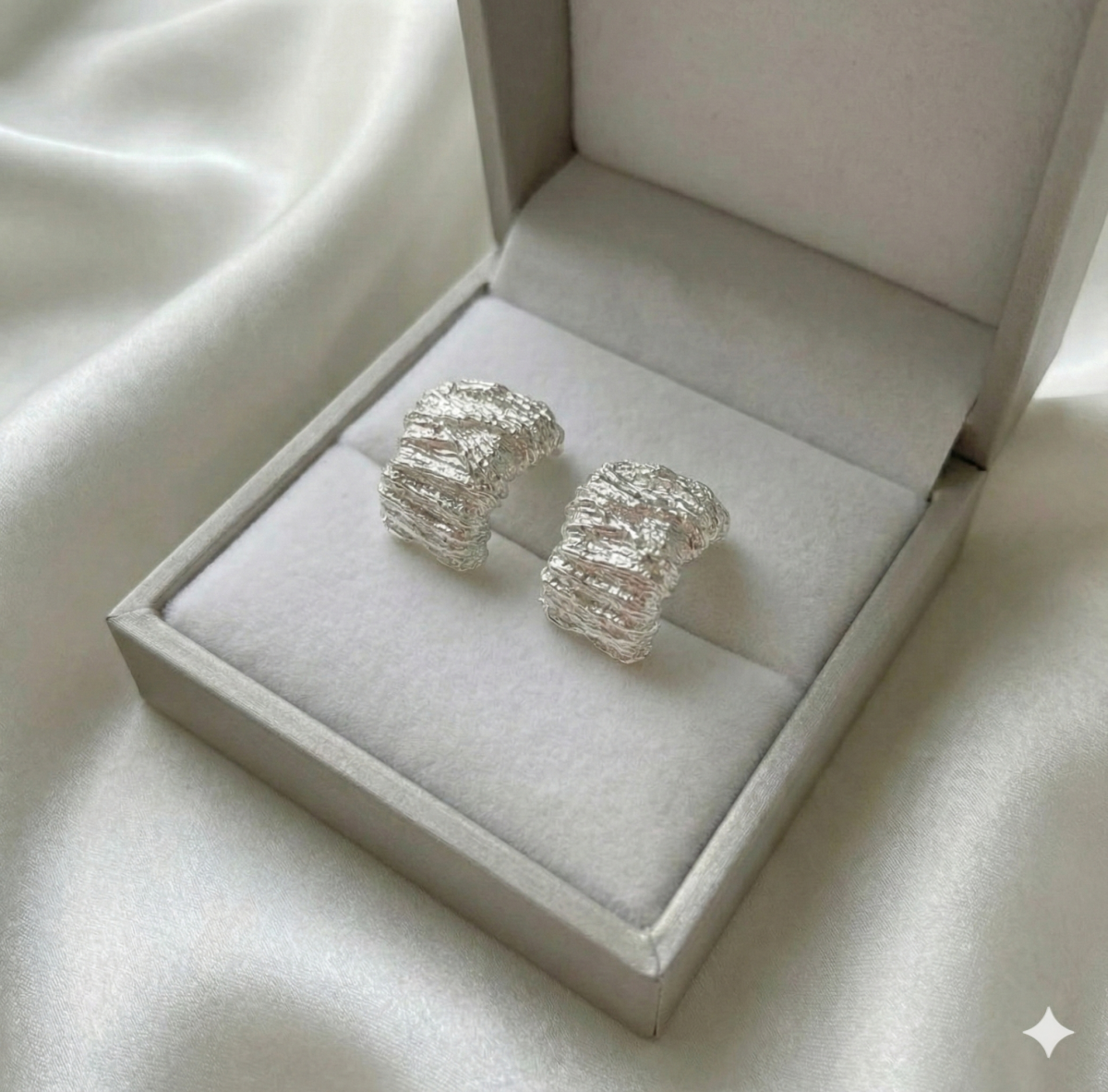 Срібні сережки "Рідка геометрія"