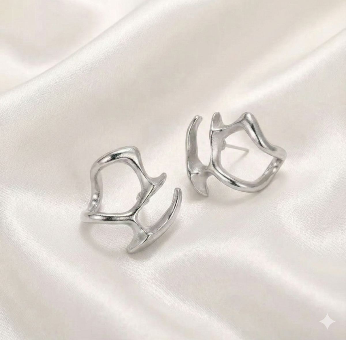 Срібні сережки "Плинна абстракція"