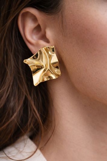 Золотисті сережки з геометричним дизайном