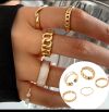 Набір золотистих каблучок 5 в 1 "Мармурова естетика": ланцюги, хвилі та перли
