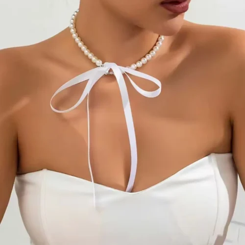 Трендовий білий перлиновий чокер з атласною стрічкою-бантом