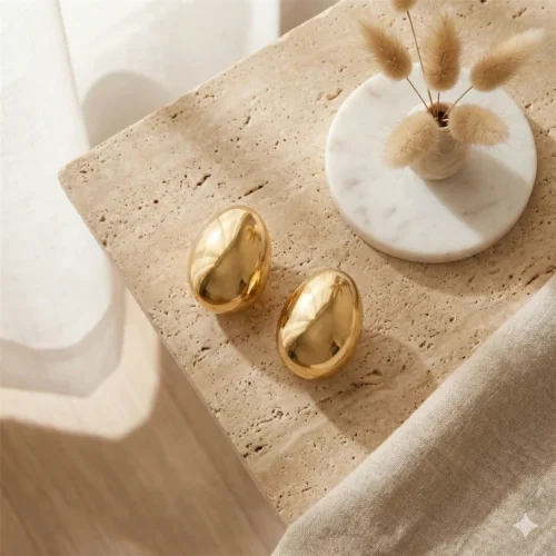 Трендові золотисті сережки-краплі в стилі Liquid Metal