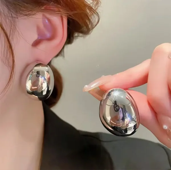 Трендові сріблясті сережки-краплі в стилі Liquid Metal (2) Трендові сріблясті сережки-краплі в стилі Liquid Metal