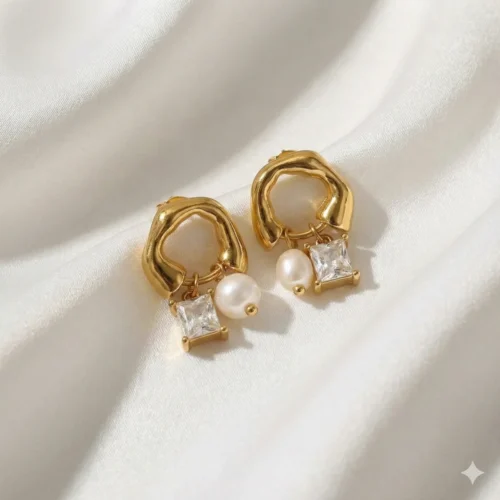 Вишукані золотисті сережки-кільця з натуральними перлами та кристалом